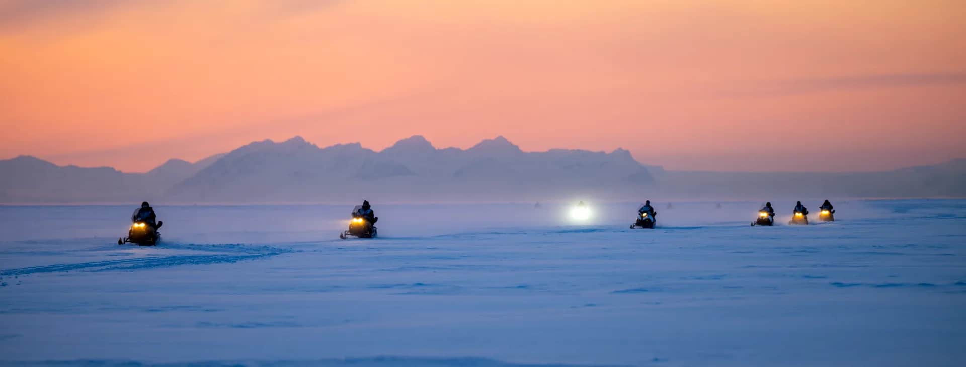 Snowmobile in Svalbard — by Rune Dahl